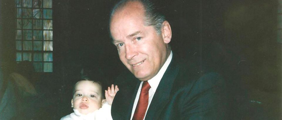 FILE PHOTO: James "Whitey" Bulger holds John Martorano's youngest son, John Jr., during his Christening ceremony in this undated handout photo provided by the U.S. Attorney's Office of Massachusetts June 18, 2013. U.S. Attorney's Office of Massachusetts/Handout/File