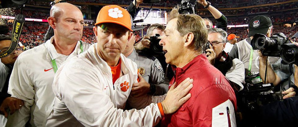 GLENDALE, AZ - JAN. 11: Head coach Nick Saban of the Alabama Crimson Tide shakes hands with head coach Dabo Swinney of the Clemson Tigers after the 2016 College Football Playoff National Championship Game at University of Phoenix Stadium on Jan. 11, 2016 in Glendale, Arizona. The Crimson Tide defeated the Tigers with a score of 45 to 40. (Photo by Christian Petersen/Getty Images)