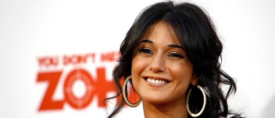 Cast member Emmanuelle Chriqui smiles at the movie premiere of "You Don't Mess with the Zohan" at the Grauman's Chinese theatre in Hollywood, California May 28, 2008. The movie opens in the U.S. on June 6. REUTERS/Mario Anzuoni