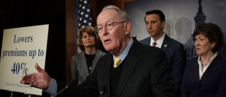 U.S. Sen. Lamar Alexander (2nd L) speaks as (L-R) Sen. Lisa Murkowski, Rep. Ryan Costello and Sen. Susan Collins listen during a news conference at the Capitol March 21, 2018 in Washington, D.C. (Photo by Alex Wong/Getty Images)