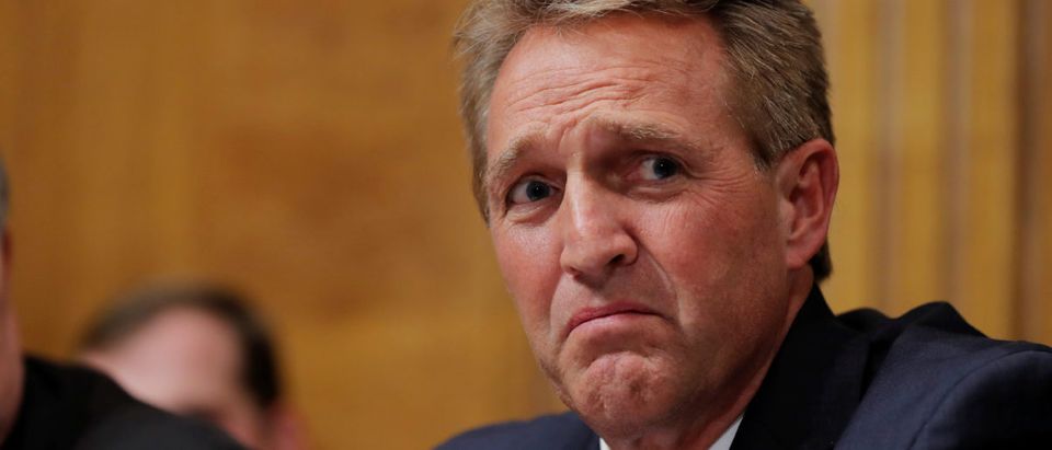 Senator Flake looks on during U.S. Supreme Court nominee Kavanaugh's confirmation hearing on Capitol Hill in Washington