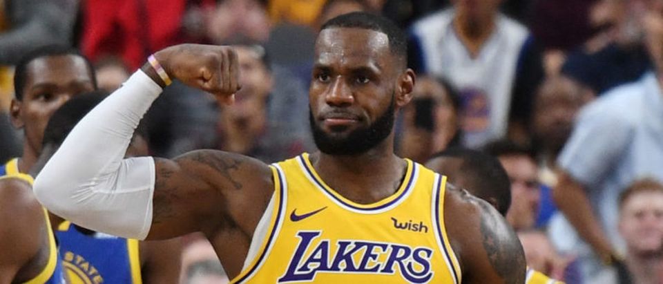 LeBron James #23 of the Los Angeles Lakers celebrates after he made a shot against the Golden State Warriors and was fouled during their preseason game at T-Mobile Arena on October 10, 2018 in Las Vegas, Nevada. The Lakers defeated the Warriors 123-113. (Photo by Ethan Miller/Getty Images)