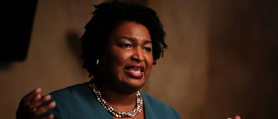 Stacey Abrams speaks at a Young Democrats of Cobb County meeting as she campaigns in Cobb County