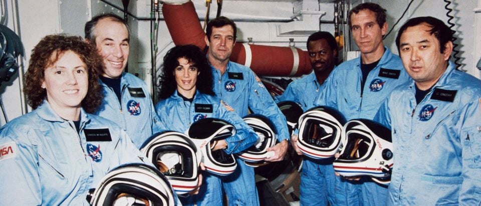 The Challenger crew takes a break during countdown training at NASA's Kennedy Space Center in this Jan. 9, 1986 NASA file photograph. (REUTERS/NASA/Handout)