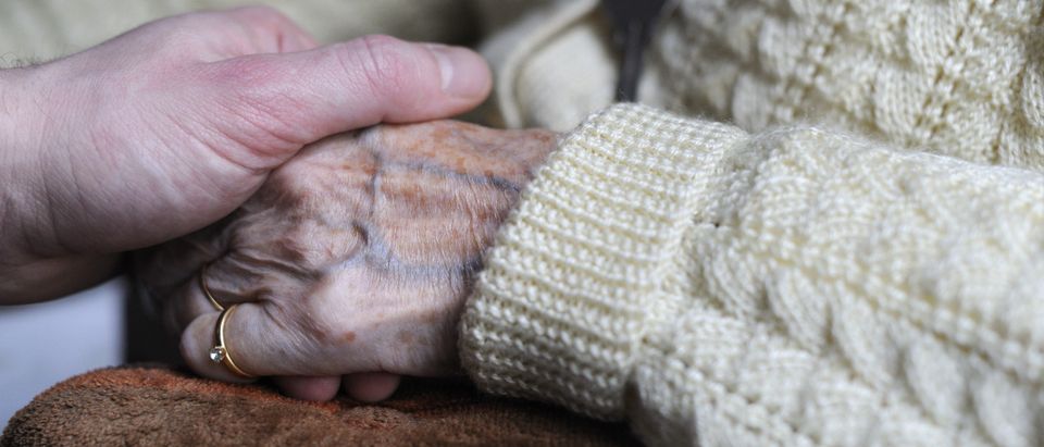 A woman, suffering from Alzheimer's dese