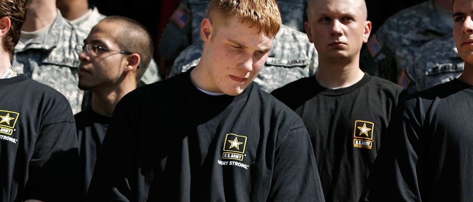 Fifteen new recruits, or "future soldiers," prepare to take the oath to join the U.S. Army at the Pentagon July 1, 2008 in Arlington, Virginia. (Photo by Chip Somodevilla/Getty Images)