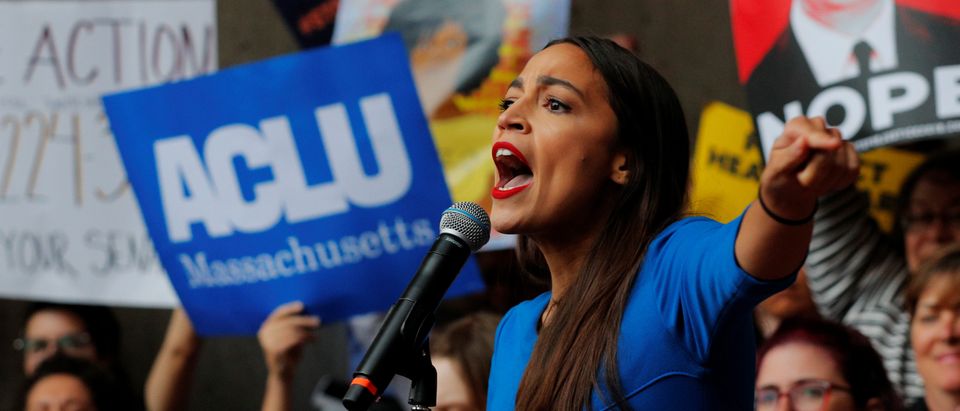 Democratic Congressional candidate Alexandria Ocasio-Cortez speaks at a really against Supreme Court nominee Brett Kavanaugh outside an expected speech by U.S. Representative Jeff Flake (R-AZ) in Boston, U.S., October 1, 2018. REUTERS/Brian Snyder.