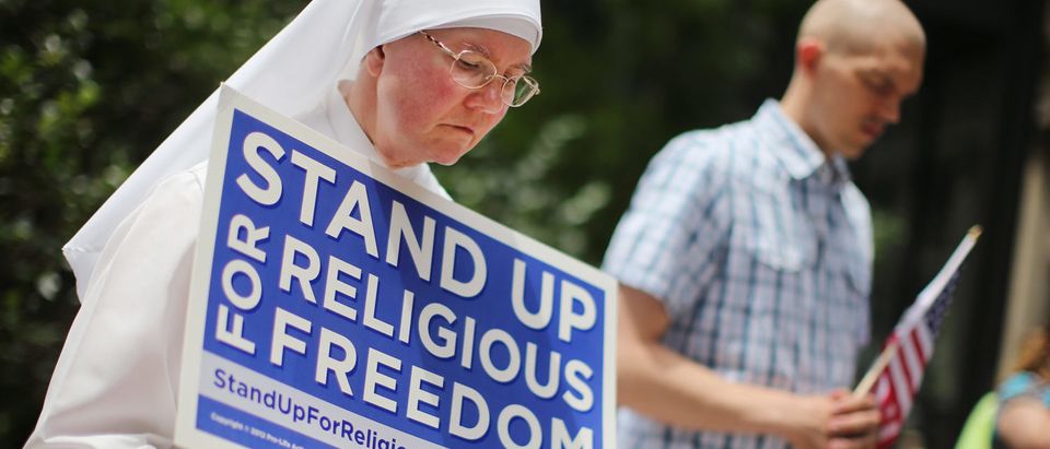 Sister Caroline attends a rally with other supporters of religious freedom to praise the Supreme Court's decision in the Hobby Lobby case. (Scott Olson/Getty Images)