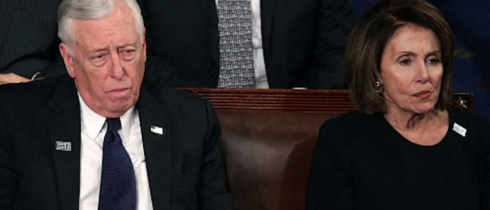 WASHINGTON, DC - JANUARY 30: U.S. Rep Steny Hoyer (D-MD) and U.S. House Minority Leader Nancy Pelosi (D-CA) watch during the State of the Union address in the chamber of the U.S. House of Representatives January 30, 2018 in Washington, DC. This is the first State of the Union address given by U.S. President Donald Trump and his second joint-session address to Congress. (Photo by Alex Wong/Getty Images)