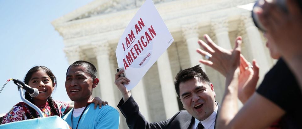 Demonstrators speak in front of the Supreme Court on April 18, 2016. (Alex Wong/Getty Images)