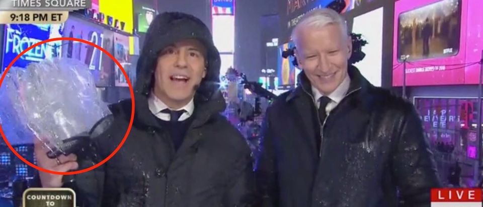 Andy Cohen argues with Times Square Alliance about umbrella. Screenshot/CNN