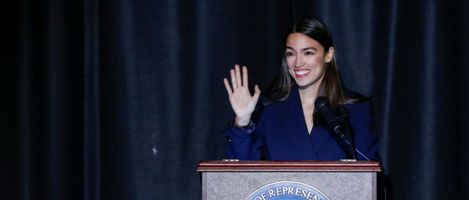 U.S. Rep. Alexandria Ocasio-Cortez (D-NY) waves to attendees during her official swearing-in ceremony in the borough of Bronx, New York, U.S., February 16, 2019. REUTERS/Eduardo Munoz
