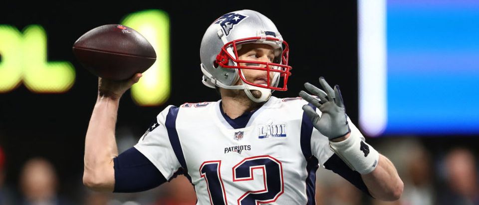 Tom Brady #12 of the New England Patriots attempts a pass against the Los Angeles Rams in the first quarter during Super Bowl LIII at Mercedes-Benz Stadium on February 03, 2019 in Atlanta, Georgia. (Photo by Maddie Meyer/Getty Images)