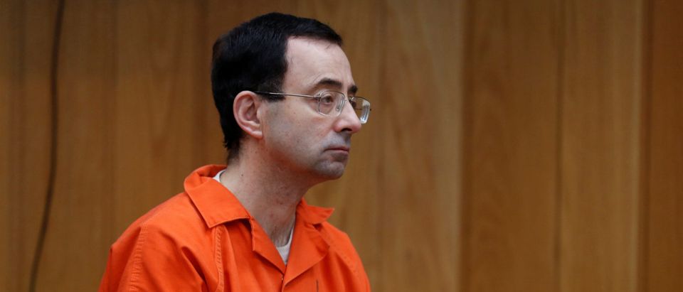 Larry Nassar, a former team USA Gymnastics doctor who pleaded guilty in November 2017 to sexual assault charges, listens to Judge Janice Cunningham during his sentencing hearing in the Eaton County Court in Charlotte