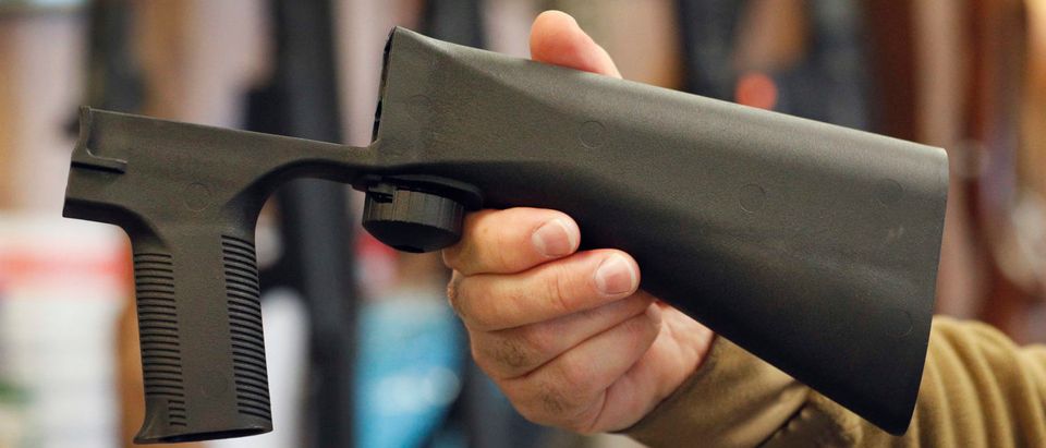 A bump stock device that fits on a semi-automatic rifle to increase the firing speed, is shown here at a gun store on October 5, 2017. (George Frey/Getty Images)