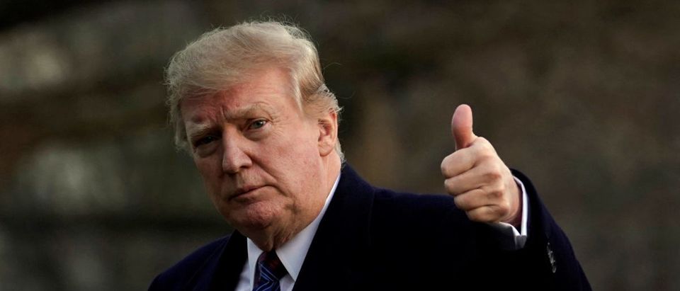 U.S. President Donald Trump thumbs up as he returns to the White House in Washington, U.S., after an annual physical test at the Walter Reed National Military Medical Center in Bethesda, Maryland, February 8, 2019. REUTERS/Yuri Gripas