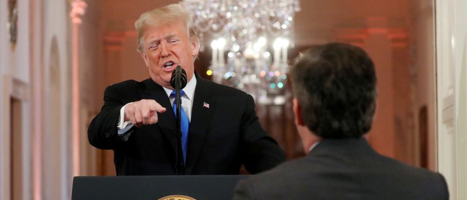 U.S. President Donald Trump points at CNN's Jim Acosta and accuses him of "fake news" while taking questions during a news conference following Tuesday's midterm congressional elections at the White House in Washington, U.S., Nov. 7, 2018. REUTERS/Kevin Lamarque