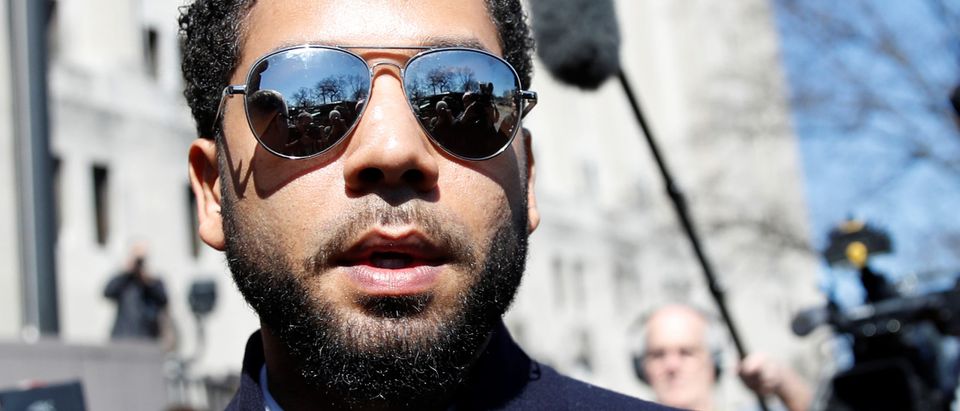 Actor Jussie Smollett leaves court after charges against him were dropped by state prosecutors in Chicago