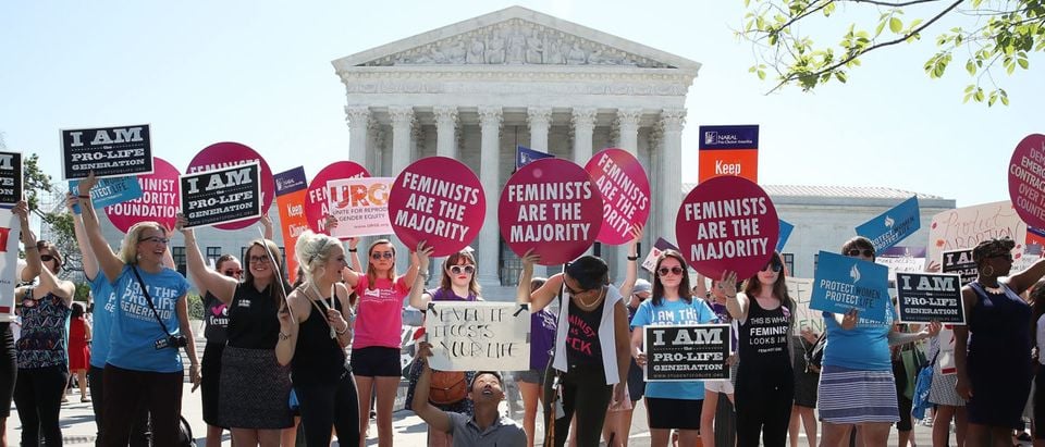 Protesters on both sides of the abortion issue rally. (Photo by Mark Wilson/Getty Images)