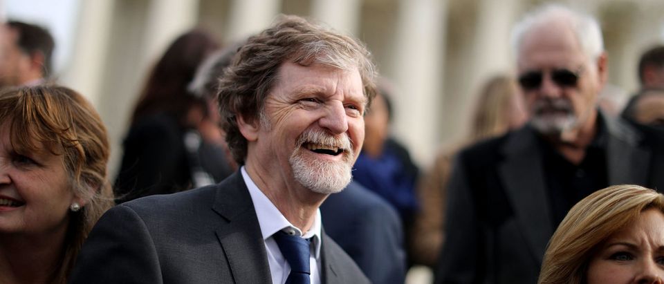 Christian baker Jack Phillips and members of his family and legal team pose for photographs in front of the Supreme Court after the court heard the case Masterpiece Cakeshop v. Colorado Civil Rights Commission on December 5, 2017. (Chip Somodevilla/Getty Images)