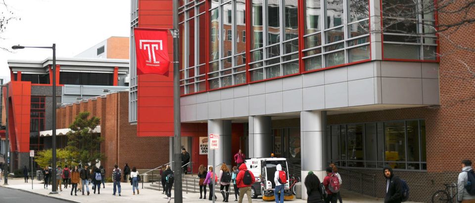 Students walk through the campus of Temple University, which has an enrollment of more than a 38,000 and offers 464 academic degree programs, in Philadelphia, Pennsylvania, U.S.