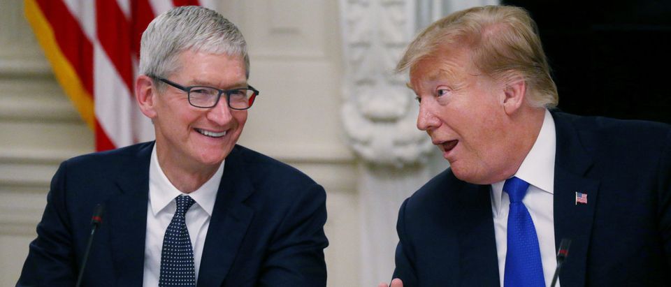 Apple CEO Cook and U.S. President Trump participate in American Workforce Policy Advisory Board meeting at the White House in Washington