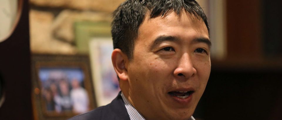 U.S. 2020 Democratic presidential candidate Andrew Yang speaks at Potluck Insurgency, a local democratic activist event, at the home of one of its members in Iowa City, Iowa