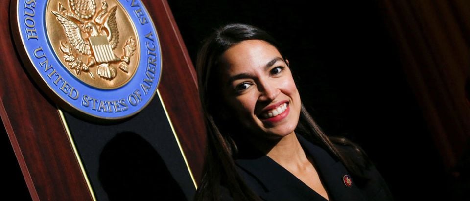 U.S. Rep. Alexandria Ocasio-Cortez (D-NY) poses for pictures at the end of her official swearing-in ceremony in the borough of Bronx, New York, U.S., February 16, 2019. REUTERS/Eduardo Munoz