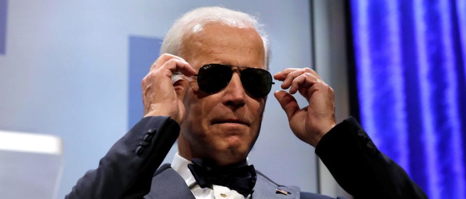 Former U.S. Vice President Joe Biden wears sunglasses at the Human Rights Campaign (HRC) dinner in Washington, U.S., September 15, 2018. REUTERS/Yuri Gripas