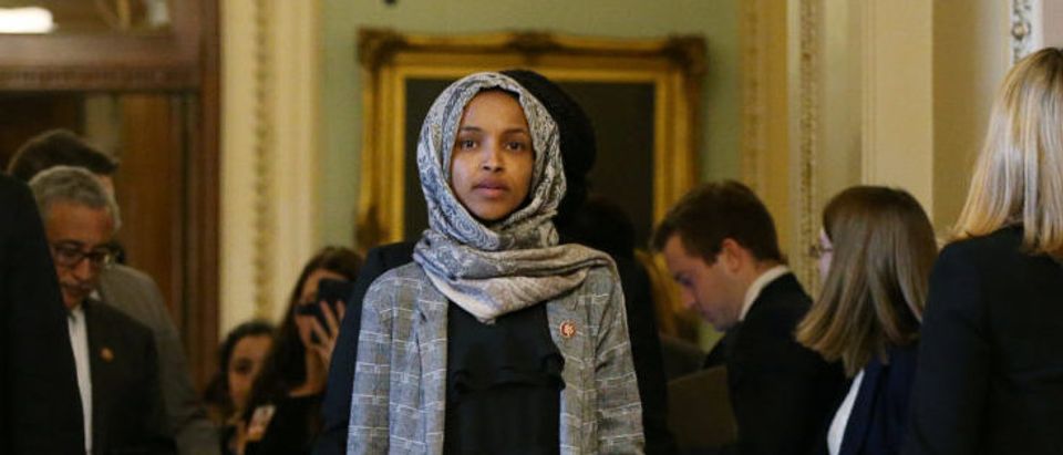 U.S. Rep. Ilhan Omar (D-MN) leaves the U.S. Senate chamber and walks back to the House of Representatives side of the Capitol with colleagues after watching the failure of both competing Republican and Democratic proposals to end the partial government shutdown in back to back votes on Capitol Hill in Washington, U.S., January 24, 2019. REUTERS/Leah Millis/File Photo