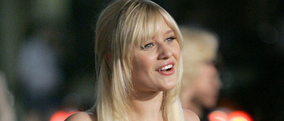 Cast member Carly Schroeder arrives at the world premiere of the Warner Brothers film "Firewall" at the Grauman's Chinese theatre in Hollywood February 2, 2006. Reuters/Mario Anzuoni