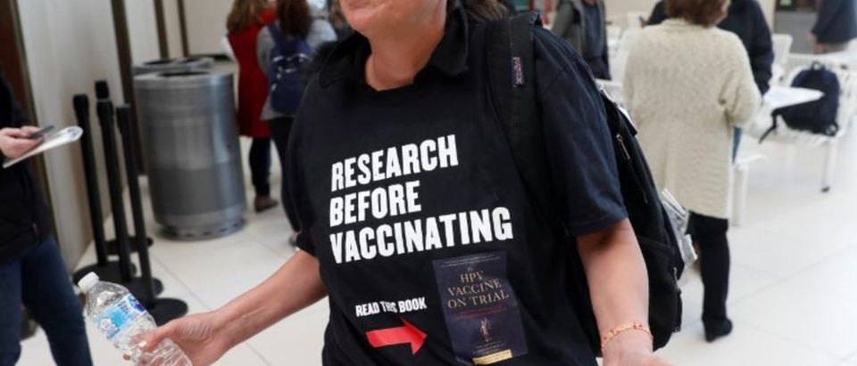 A woman opposed to childhood vaccinations takes part in a demonstration after officials in Rockland County, a New York City suburb, banned children not vaccinated against measles from public spaces, in West Nyack, New York, U.S. March 28, 2019. (REUTERS/Mike Segar)