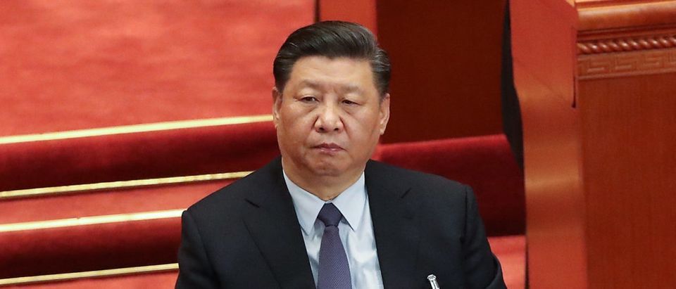 Chinese President Xi Jinping listens at Chairman of the Standing Committee of the National People's Congress (NPC) Li Zhanshu's speech, during the second plenary meeting of the NPC at The Great Hall Of The People on March 8, 2019 in Beijing, China. (Photo by Andrea Verdelli/Getty Images)