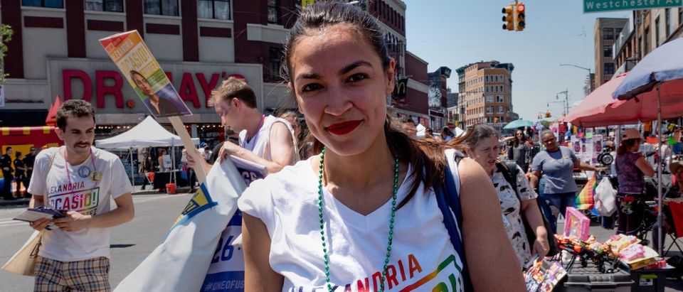 Alexandria Ocasio-Cortez marches during the Bronx's pride parade in the Bronx borough of New York City