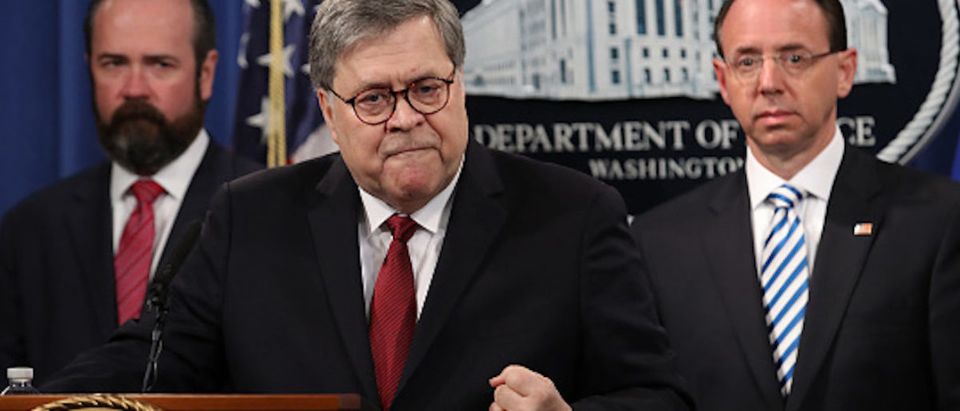 Attorney General William Barr (C) speaks about the release of the redacted version of the Mueller report at the Department of Justice April 18, 2019 in Washington, DC