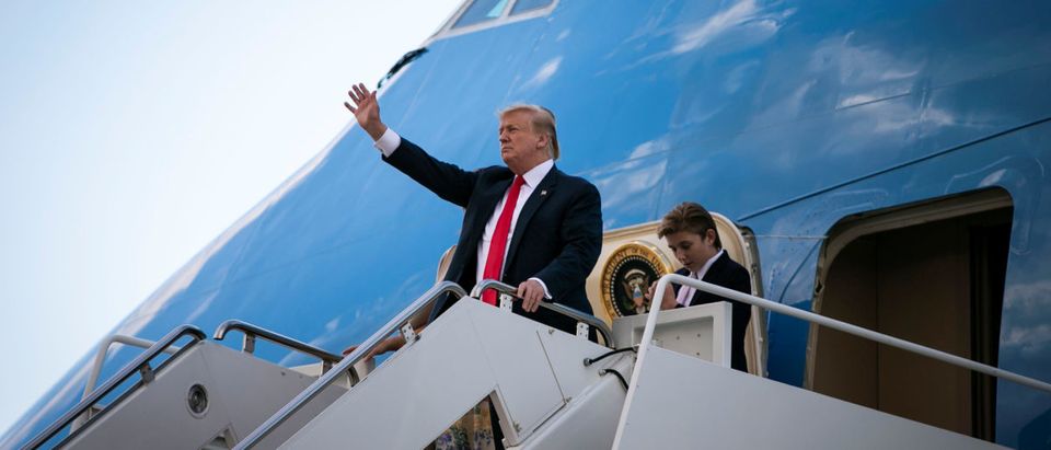 U.S. President Donald Trump waves as he arrives aboard Air Force One with Barron Trump, after spending Easter weekend at his Mar-a-Lago club, at Joint Base Andrews, Maryland, U.S., April 21, 2019. REUTERS/Al Drago