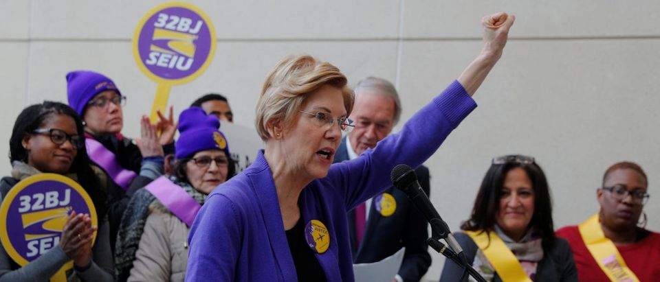 Potential 2020 Democratic presidential candidate and U.S. Senator Elizabeth Warren (D-MA) speaks about federal government employees working without pay and workers trying to unionize at Logan Airport in Boston, Massachusetts, U.S., January 21, 2019. REUTERS/Brian Snyder