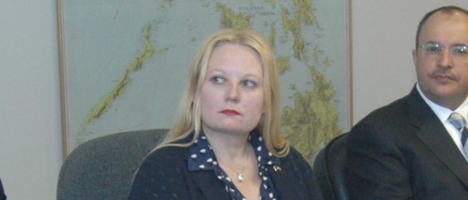 Marsha Lazareva sits in a meeting in March 2012. Courtesy of KGL Investment