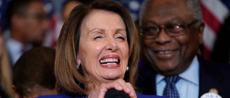 Speaker of the House Nancy Pelosi laughs before speaking about the Voting Rights Enhancement Act, H.R. 4 on Capitol Hill on Feb. 26, 2019 in Washington, D.C. (Photo by Joshua Roberts/Getty Images)