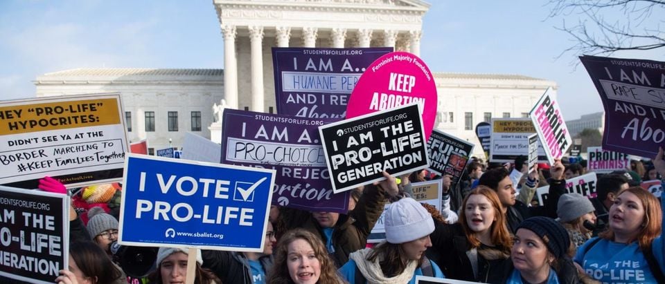 Pro-life and pro-choice demonstrators rally outside the Supreme Court on January 18, 2019. (Saul Loeb/AFP/Getty Images)