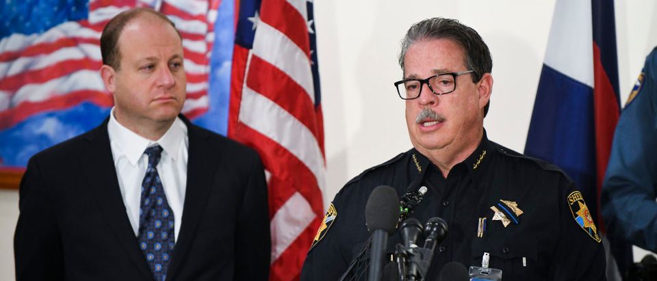Colorado Gov. Jared Polis (L), looks on as Douglas County sheriff Tony Spurlock speaks to the media regarding the shooting at STEM School Highlands Ranch during a press conference at the Douglas County Sheriffs Office Highlands Ranch Substation on May 8, 2019 in Highlands Ranch, Colorado.(Photo by Michael Ciaglo/Getty Images)