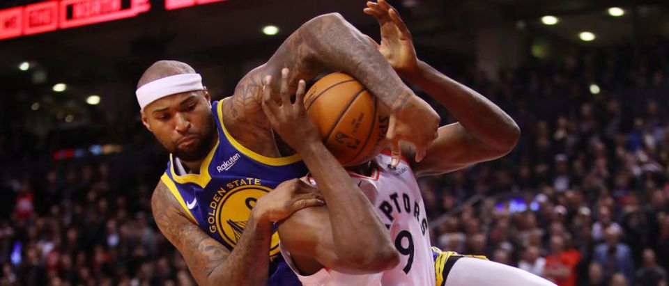 TORONTO, ONTARIO - MAY 30: DeMarcus Cousins #0 of the Golden State Warriors attempts to block a shot from Serge Ibaka #9 of the Toronto Raptors in the second half during Game One of the 2019 NBA Finals at Scotiabank Arena on May 30, 2019 in Toronto, Canada. (Photo by Gregory Shamus/Getty Images)