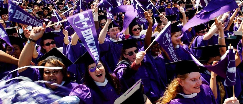 Graduating students celebrate during commencement exercises May 16, 2002 at New York University in New York City. (Spencer Platt/Getty Images)
