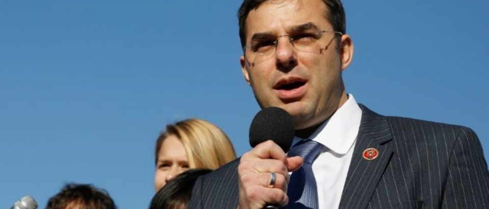 U.S. Representative Justin Amash (R-MI) addresses the "Stop Watching Us: A Rally Against Mass Surveillance" near the U.S. Capitol in Washington, October 26, 2013. REUTERS/Jonathan Ernst