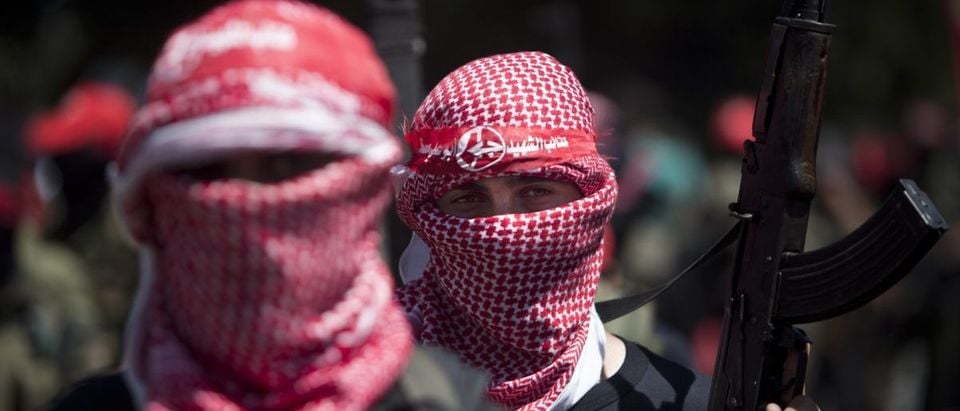 A masked Palestinian militant of the Popular Front for the Liberation of Palestine is pictured. (PFLP) MAHMUD HAMS/AFP/Getty Images)