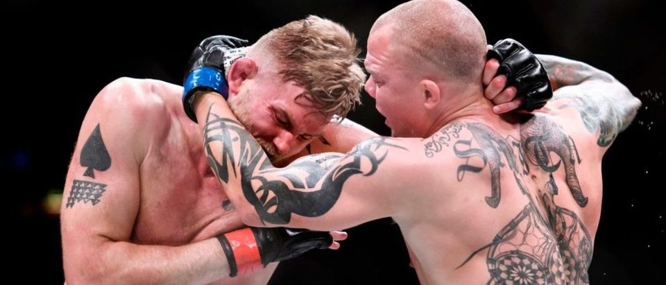 Sweden's Alexander Gustafsson (L) fights against the US' Anthony Smith (R) during the MMA International UFC Fight Night at the Globe Arena in Stockholm on June 1, 2019. (Photo credit: ERIK SIMANDER/AFP/Getty Images)