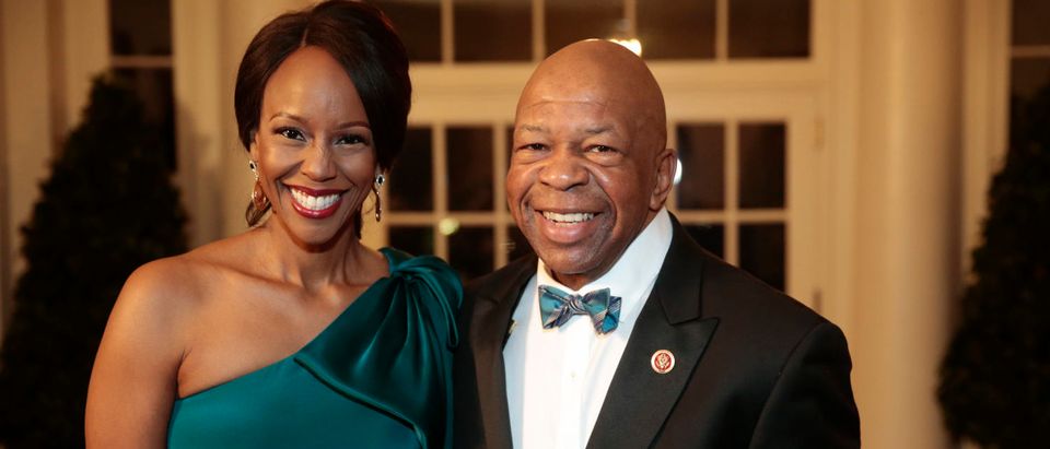 Rep. Elijah Cummings, a Democrat from Maryland, right, and Maya Rockeymoore Cummings arrive to a state dinner hosted by U.S. President Barack Obama and U.S. first lady Michelle Obama in honor of French President Francois Hollande at the White House on Feb. 11, 2014 in Washington, D.C. (Photo by Andrew Harrer-Pool/Getty Images)