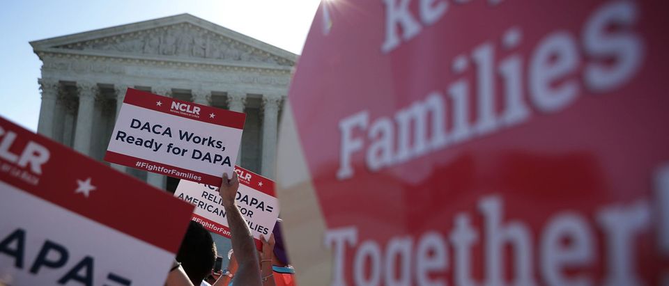 Pro-immigration activists gather in front of the Supreme Court on April 18, 2016. (Alex Wong/Getty Images)