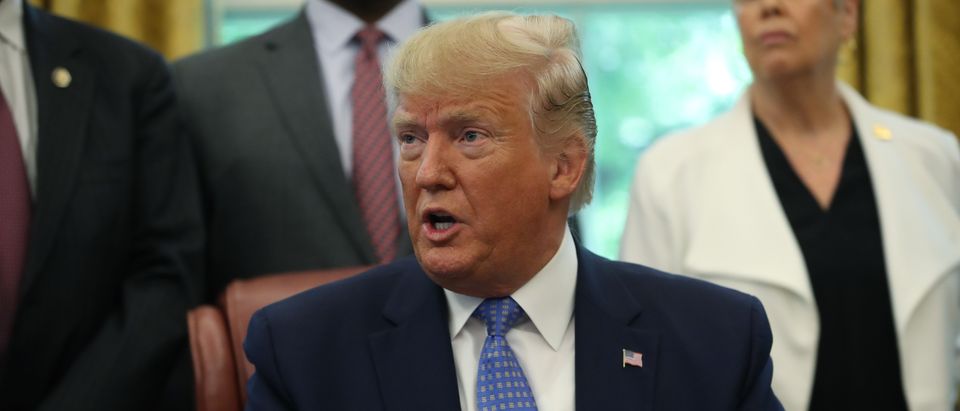 U.S. President Donald Trump speaks to reporters about Iran and Mexico after signing an executive order establishing a White House Council on eliminating regulatory barriers to affordable housing, in the Oval Office at the White House on June 25, 2019 in Washington, D.C. (Mark Wilson/Getty Images)