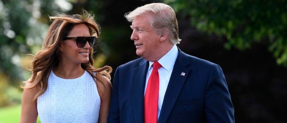 US President Donald Trump and First Lady Melania Trump walk to Marine One as they depart from the South Lawn from the White House in Washington, DC, on June 18, 2019. - US President Trump is on the way to Orlando, Florida for the first official rally of his 2020 re-election campaign. (Photo credit: JIM WATSON/AFP/Getty Images)